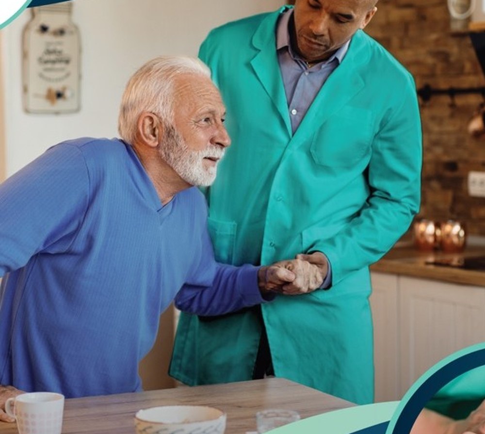 An older adult receiving support from a caregiver at home
